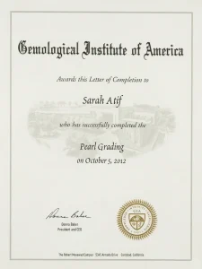 GIA Pearl Grading Letter of Completion for Sarah Atif at Veluna Pearls, verifying AAA luster grading expertise.